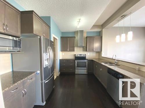 6504 49 Avenue, Beaumont, AB - Indoor Photo Showing Kitchen With Double Sink With Upgraded Kitchen