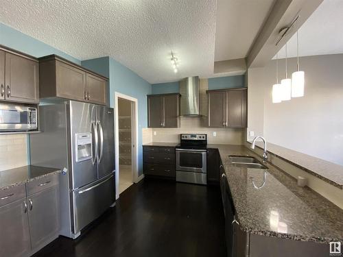 6504 49 Avenue, Beaumont, AB - Indoor Photo Showing Kitchen With Double Sink With Upgraded Kitchen