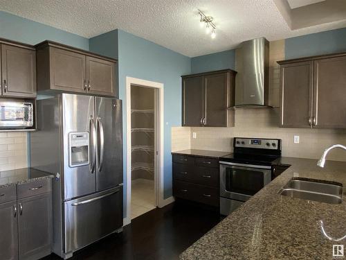 6504 49 Avenue, Beaumont, AB - Indoor Photo Showing Kitchen With Double Sink With Upgraded Kitchen