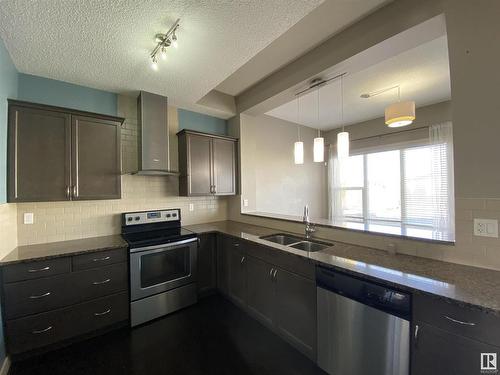 6504 49 Avenue, Beaumont, AB - Indoor Photo Showing Kitchen With Double Sink With Upgraded Kitchen