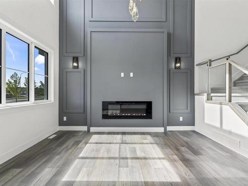 4723 168 Avenue, Edmonton, AB - Indoor Photo Showing Living Room With Fireplace