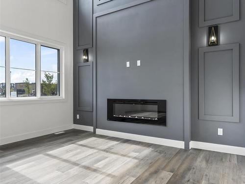 4723 168 Avenue, Edmonton, AB - Indoor Photo Showing Living Room With Fireplace