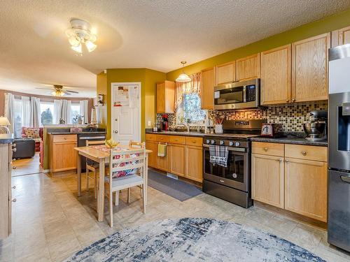 33 Spruce Meadow Lane, Bon Accord, AB - Indoor Photo Showing Kitchen With Stainless Steel Kitchen With Double Sink