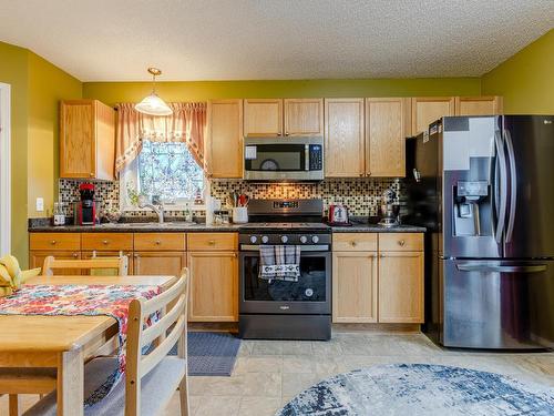 33 Spruce Meadow Lane, Bon Accord, AB - Indoor Photo Showing Kitchen With Stainless Steel Kitchen With Double Sink