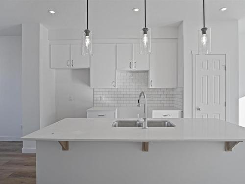 1234 Mcleod Avenue, Spruce Grove, AB - Indoor Photo Showing Kitchen With Double Sink With Upgraded Kitchen