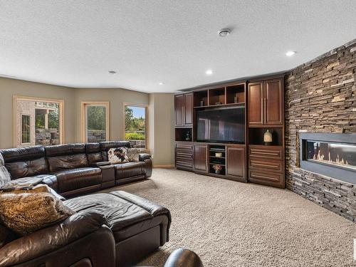 1 26029 Twp Rd 512, Rural Parkland County, AB - Indoor Photo Showing Living Room With Fireplace