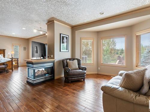 1 26029 Twp Rd 512, Rural Parkland County, AB - Indoor Photo Showing Living Room With Fireplace