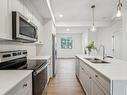 10245 92A Avenue, Morinville, AB  - Indoor Photo Showing Kitchen With Double Sink With Upgraded Kitchen 