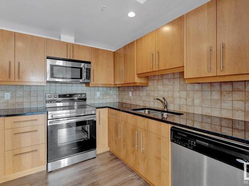 708 6608 28 Avenue, Edmonton, AB - Indoor Photo Showing Kitchen With Stainless Steel Kitchen With Double Sink