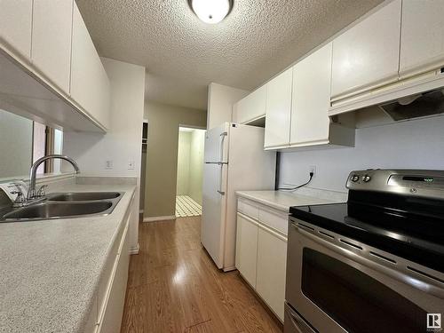 205 17467 98A Avenue, Edmonton, AB - Indoor Photo Showing Kitchen With Double Sink