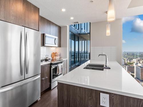 3301 10180 103 Street, Edmonton, AB - Indoor Photo Showing Kitchen With Stainless Steel Kitchen With Double Sink With Upgraded Kitchen