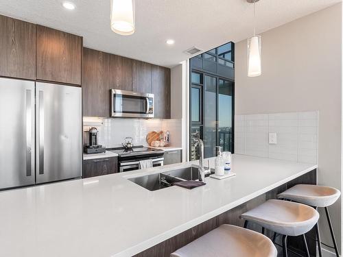 3301 10180 103 Street, Edmonton, AB - Indoor Photo Showing Kitchen With Stainless Steel Kitchen With Double Sink With Upgraded Kitchen