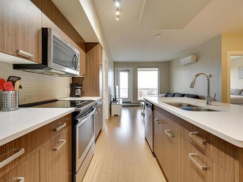 1805 10410 102 Avenue, Edmonton, AB - Indoor Photo Showing Kitchen With Double Sink With Upgraded Kitchen