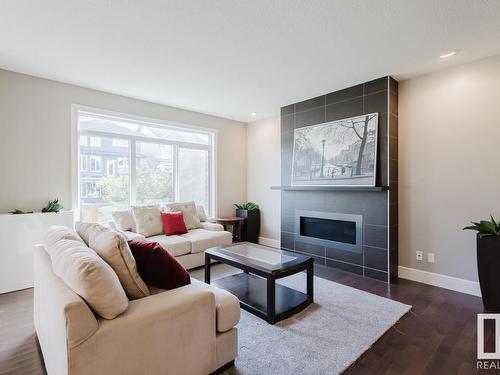 3257 Abbott Crescent, Edmonton, AB - Indoor Photo Showing Living Room With Fireplace