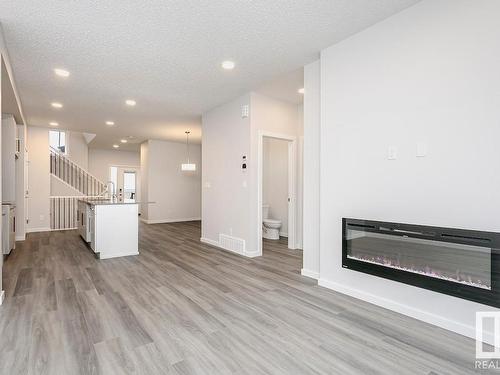 33 Gambel Loop, Spruce Grove, AB - Indoor Photo Showing Living Room With Fireplace