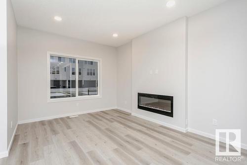 31 Gambel Loop, Spruce Grove, AB - Indoor Photo Showing Living Room With Fireplace