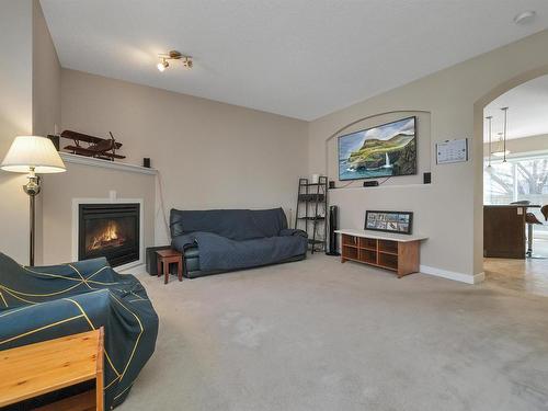 8 13825 155 Avenue, Edmonton, AB - Indoor Photo Showing Living Room With Fireplace