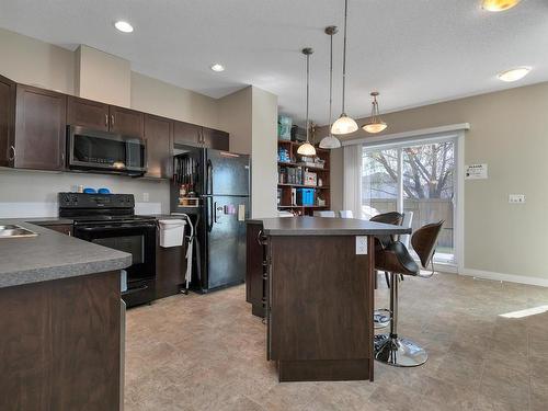 8 13825 155 Avenue, Edmonton, AB - Indoor Photo Showing Kitchen