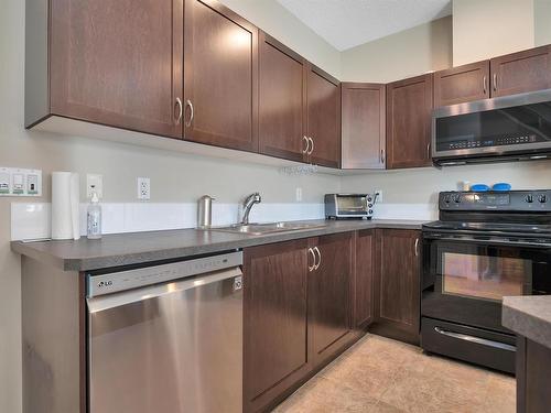 8 13825 155 Avenue, Edmonton, AB - Indoor Photo Showing Kitchen