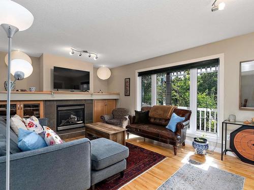 10906 72 Avenue, Edmonton, AB - Indoor Photo Showing Living Room With Fireplace