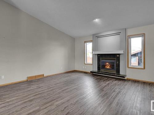 5302 59 Avenue, Vegreville, AB - Indoor Photo Showing Living Room With Fireplace