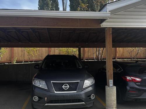 216 2305 35A Avenue, Edmonton, AB - Indoor Photo Showing Garage