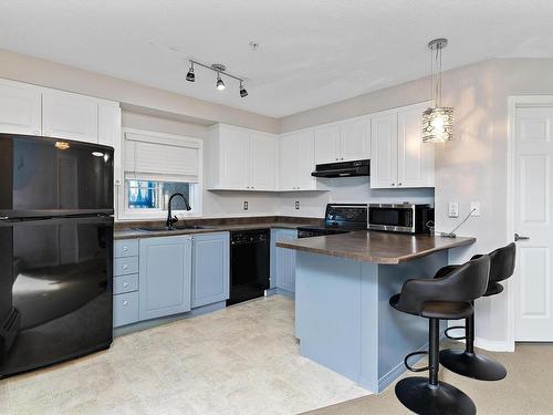 301 622 Mcallister Loop, Edmonton, AB - Indoor Photo Showing Kitchen With Double Sink