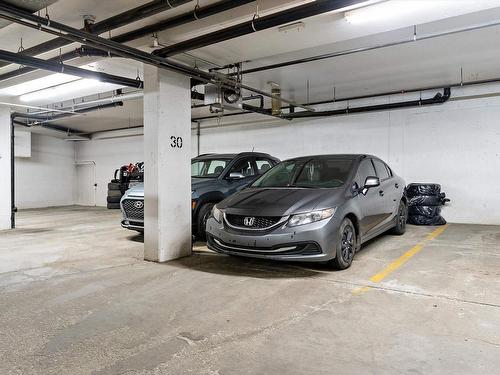 301 622 Mcallister Loop, Edmonton, AB - Indoor Photo Showing Garage