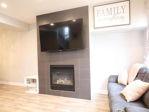 11906 68 Street, Edmonton, AB - Indoor Photo Showing Living Room With Fireplace