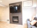 11906 68 Street, Edmonton, AB  - Indoor Photo Showing Living Room With Fireplace 