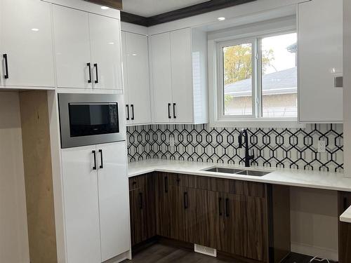 1 12122 43 Street, Edmonton, AB - Indoor Photo Showing Kitchen With Double Sink