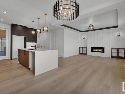 20912 128 Avenue, Edmonton, AB - Indoor Photo Showing Kitchen With Fireplace