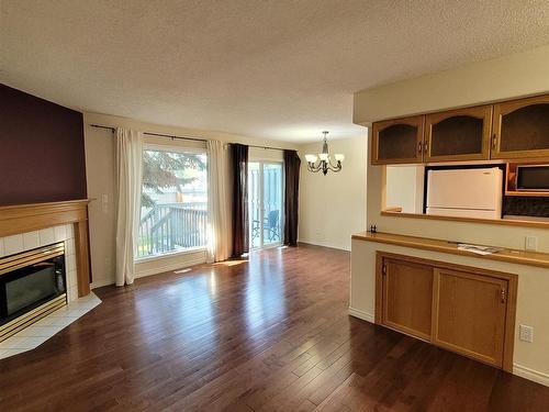 105 Bulyea Road, Edmonton, AB - Indoor Photo Showing Living Room With Fireplace