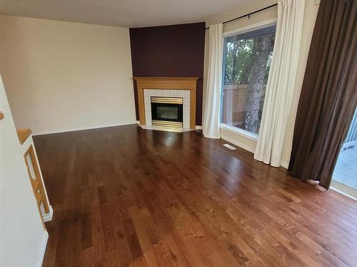 105 Bulyea Road, Edmonton, AB - Indoor Photo Showing Living Room With Fireplace