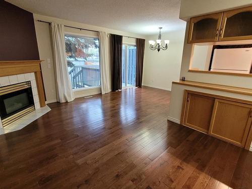 105 Bulyea Road, Edmonton, AB - Indoor Photo Showing Living Room With Fireplace