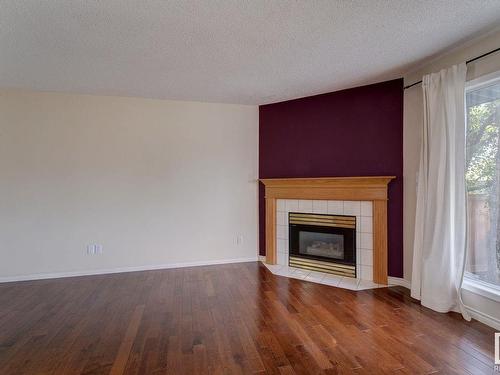 105 Bulyea Road, Edmonton, AB - Indoor Photo Showing Living Room With Fireplace