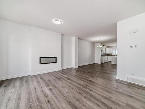 440 29 Street, Edmonton, AB - Indoor Photo Showing Living Room With Fireplace