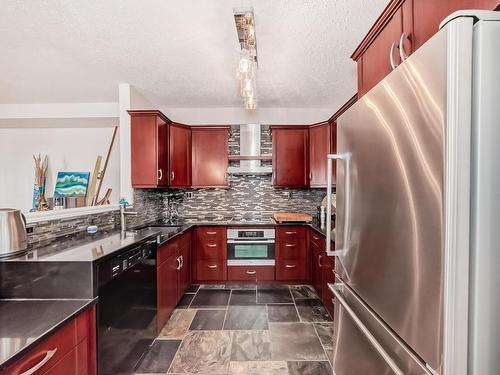 102 7905 96 Street, Edmonton, AB - Indoor Photo Showing Kitchen With Double Sink