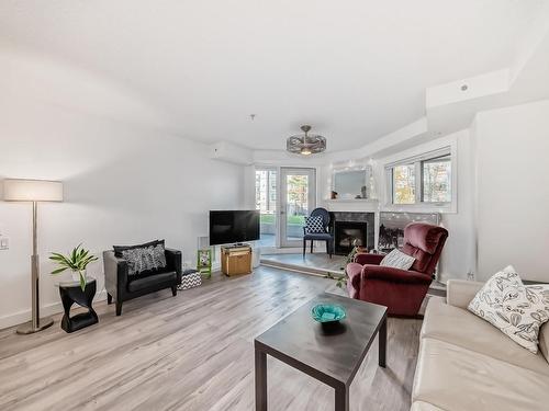 102 7905 96 Street, Edmonton, AB - Indoor Photo Showing Living Room With Fireplace