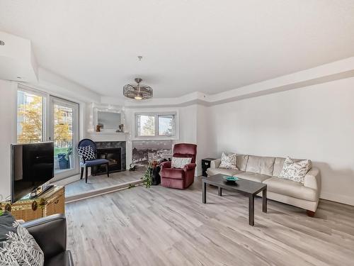 102 7905 96 Street, Edmonton, AB - Indoor Photo Showing Living Room With Fireplace