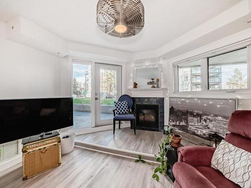 102 7905 96 Street, Edmonton, AB - Indoor Photo Showing Living Room With Fireplace