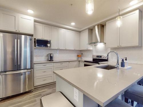 407 1316 Windermere Way, Edmonton, AB - Indoor Photo Showing Kitchen With Upgraded Kitchen