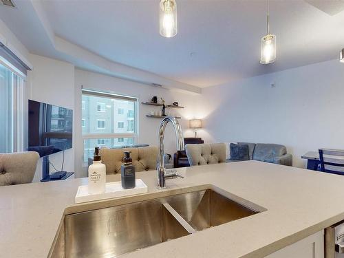 407 1316 Windermere Way, Edmonton, AB - Indoor Photo Showing Kitchen With Double Sink