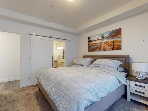 407 1316 Windermere Way, Edmonton, AB - Indoor Photo Showing Bedroom