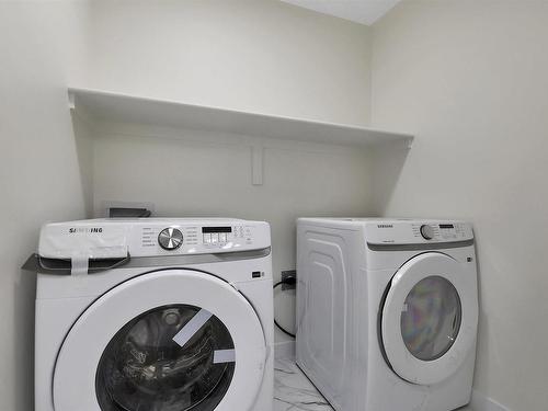 397 Bluff Cove, Leduc, AB - Indoor Photo Showing Laundry Room