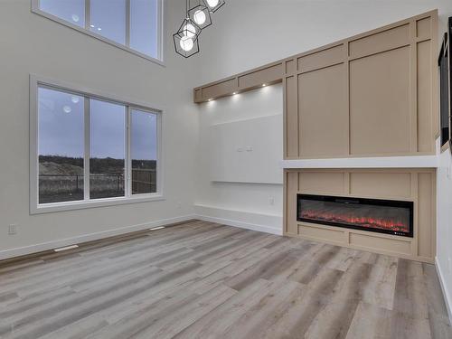 397 Bluff Cove, Leduc, AB - Indoor With Fireplace