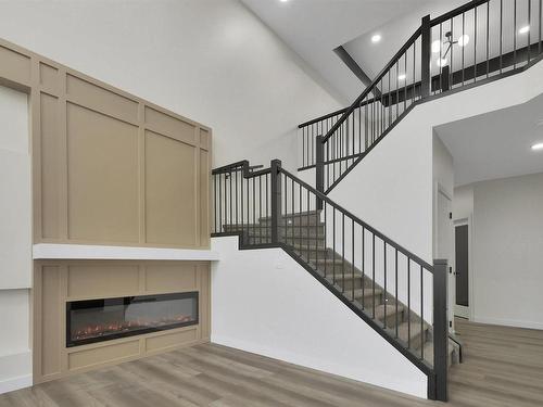 397 Bluff Cove, Leduc, AB - Indoor With Fireplace