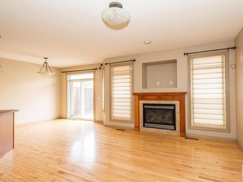 11518 11 Avenue, Edmonton, AB - Indoor Photo Showing Living Room With Fireplace