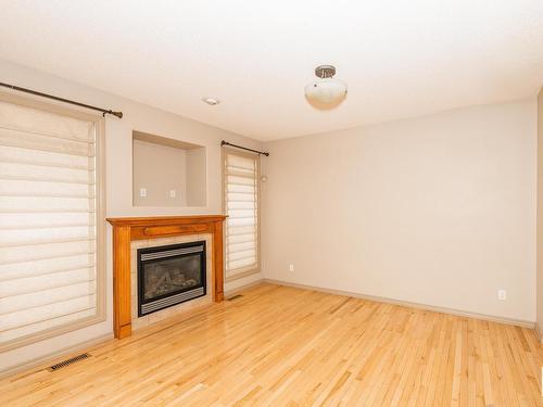 11518 11 Avenue, Edmonton, AB - Indoor Photo Showing Living Room With Fireplace