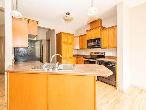 11518 11 Avenue, Edmonton, AB - Indoor Photo Showing Kitchen With Double Sink